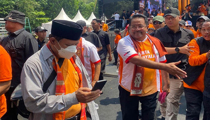 Pramono Anung-Rano Karno Kampanye di Jakarta Tanpa Atribut Partai, Warga Sepakat Menggunakan Kaos Warna Oranye