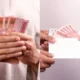 Ilustrasi Kpm Menerima Saldo Bansos Pkh Dan Bpnt Tahap 2 Di Rekening Kks Bri Akhir Juni 2025